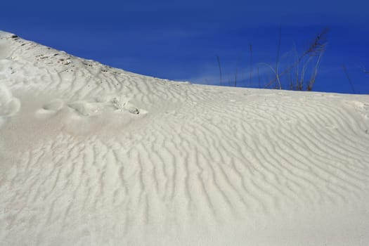white sand mound quarry like a moon landscape