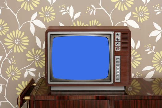 retro wooden tv on wooden vitage 60s furniture floral wallpaper