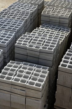 stacked construction block piles pattern