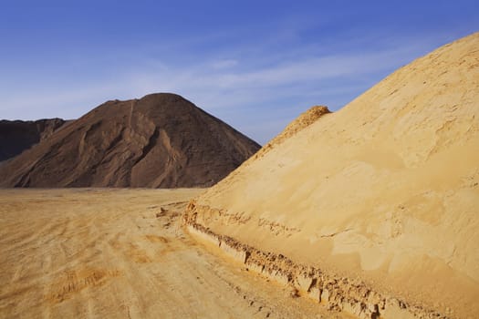 colorful construction sand mound quarry variety of sands