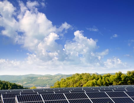 green energy solar plates to provide mountain valley village