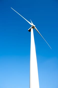 aerogenerator windmill in blue sky background