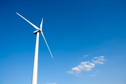 aerogenerator windmill in blue sky background