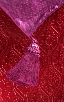 Red wallpaper, and pink purple braid, shiny and decorated eastern pattern background