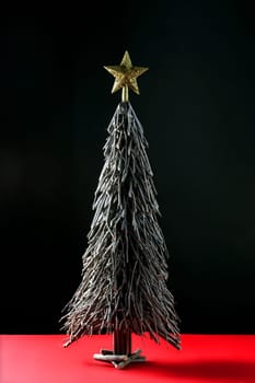 Original wood sticks christmas tree, simple at studio background