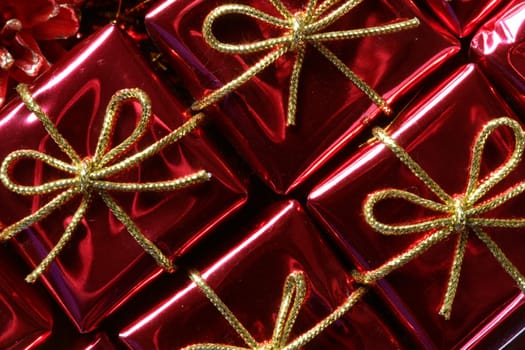 Christmas present, gift over red studio background