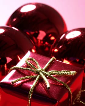 Christmas present, gift over red studio background