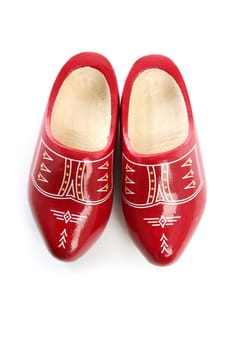 Dutch Holland red wooden shoes isolated on white studio background