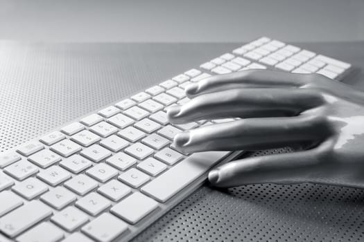 computer keyboard aluminum gray hand silver background