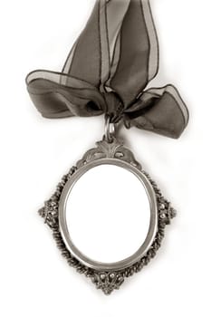Cameo silver locket with tape loop copyspace isolated on white