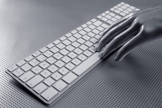 computer keyboard aluminum gray hand silver background