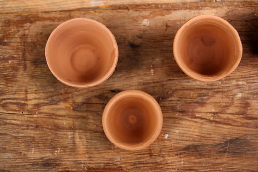 clay crafts pottery studio wood table traditional potter work warm color