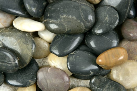 Rolling dark stones shiny texture pattern background