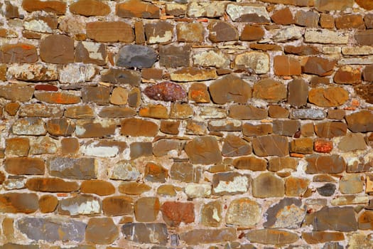 colorful masonry wall stone construction house in Pyrenees