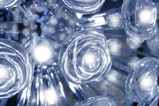 glass roses lamp transparent blue glowing light detail macro