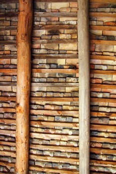 Clay square roof tiles ceiling indoor wooden beams view in Pyrenees
