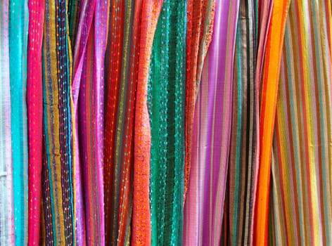 Indian colorful scarf in a row scarves vivid colors stripes