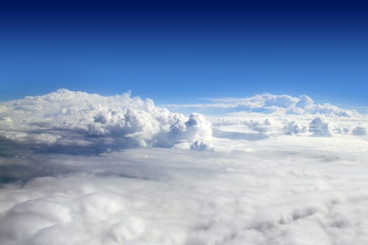 blue sky high view from airplane clouds shapes