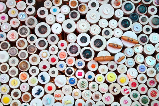 buttons in haberdashery retail shop colorful pattern background