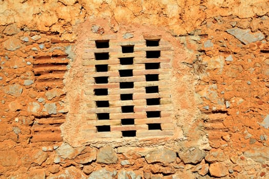 bricks window in masonry wall ancient architecture detail
