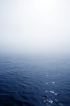 Blue fog sea in a foggy day with low ocean visibility