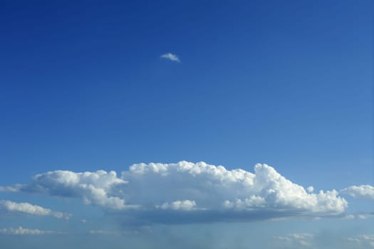 Blue sky with white clouds horizontal image
