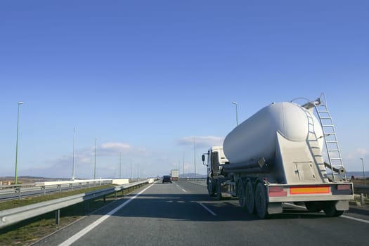 Heavy liquid transportation truck lorry on a road