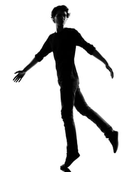young man silhouette in studio isolated on white background