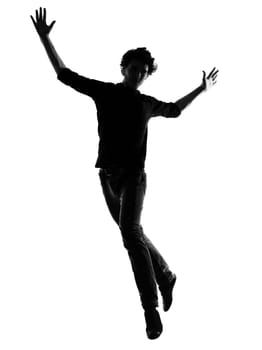 young man silhouette in studio isolated on white background