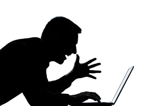 one caucasian business man computing computer laptop happy portrait silhouette in studio isolated on white background