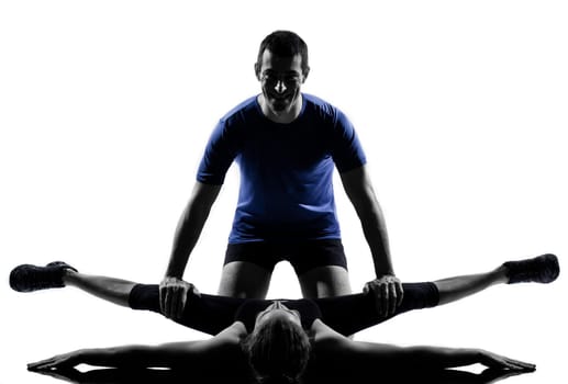 couple woman man exercising workout fitness aerobics posture in silhouette studio isolated on white background