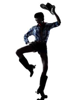 one woman cowgirl  dancer happy dancing country music in studio isolated on white background