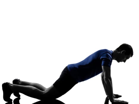 man exercising workout fitness aerobics posture in silhouette studio isolated on white background