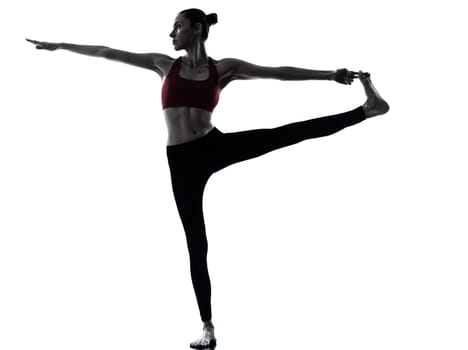 one caucasian woman exercising yoga  Revolved Hand to Big Toe Pose in silhouette studio isolated on white background