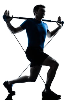 one caucasian man exercising gymstick workout fitness in silhouette studio  isolated on white background