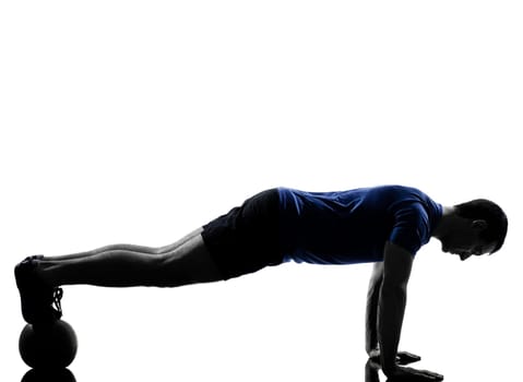 man exercising workout fitness aerobics posture in silhouette studio isolated on white background