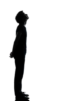 one caucasian young teenager silhouette boy or girl full length in studio cut out isolated on white background