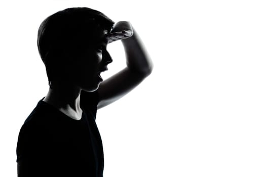 one caucasian young teenager silhouette boy or girl  looking foward  portrait in studio cut out isolated on white background