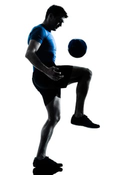 one caucasian man playing soccer football player silhouette  in studio isolated on white background
