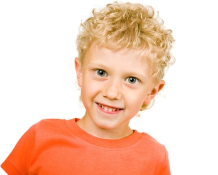 Portrait of smiling boy looking at camera on a white background