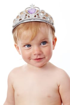 Portrait of cute child in crown over white background