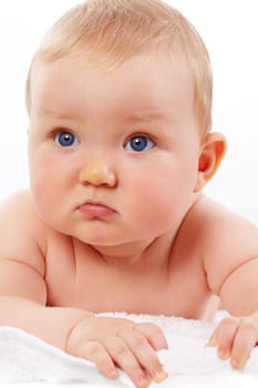 Portrait of small girl with serene expression looking aside