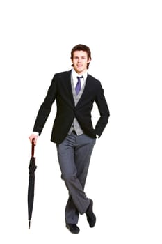 Image of successful businessman in elegant suit with folded umbrella