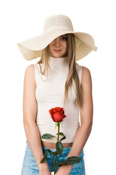 Portrait of elegant lady in hat wnd rose in hands over white background