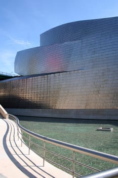 BILBAO, SPAIN - JULY 30: Exterior view of the Guggenheim Museum at sunset on July 30, 2011 in Bilbao, Spain. This Museum is dedicated exhibition of modern art and was designed by Frank Gehry.