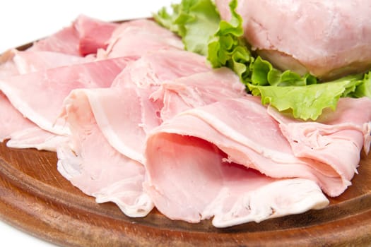 fresh ham on wooden board