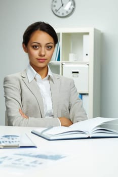 Photo of smart businesswoman looking at camera