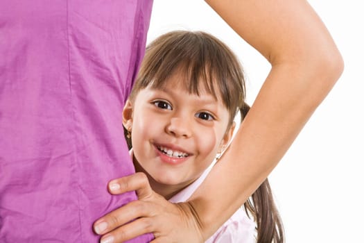 Face of happy child looking through her mother arm bent in elbow over white background