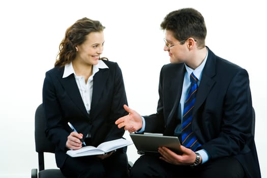 Business man giving a working advice to young woman
