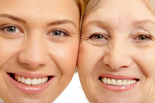 Close-up of two faces of beautiful woman and mother